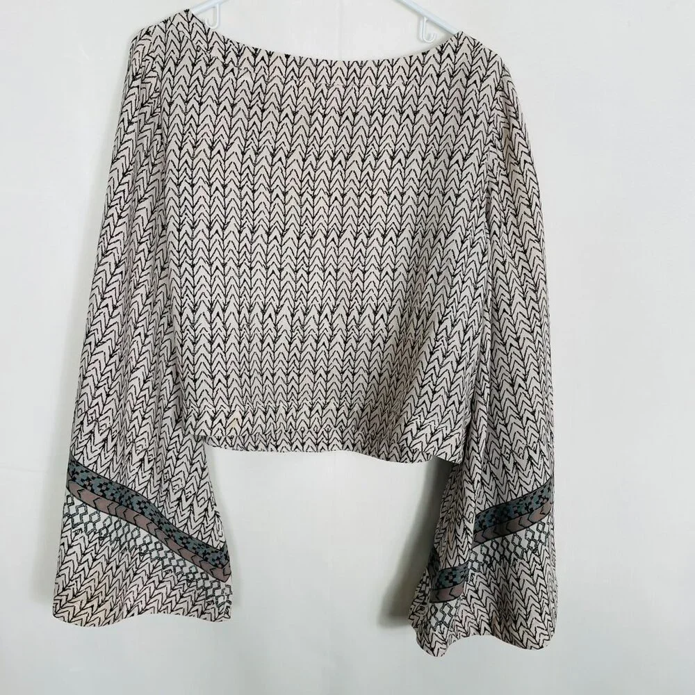 FREE PEOPLE Stars Aligned Bell Sleeve Crop Top Blouse in Chevron Tribal Size M